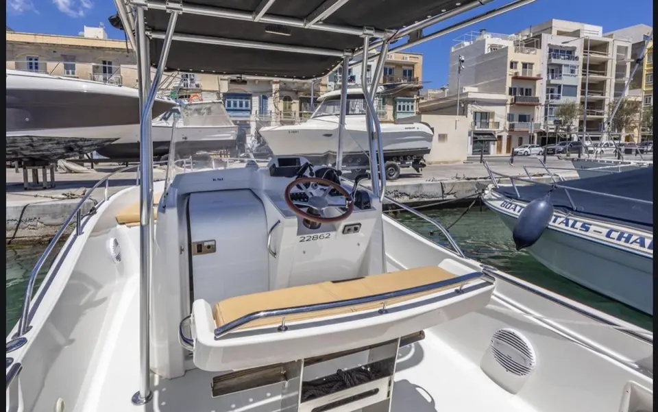 Deck and helm of the White Shark 25 at Msida Marina